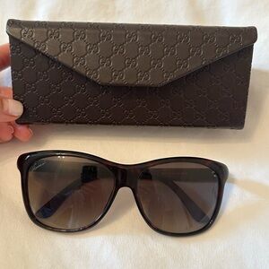 Gucci women’s sunglasses.